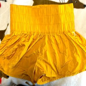 I’m selling xs free people yellow active shorts.